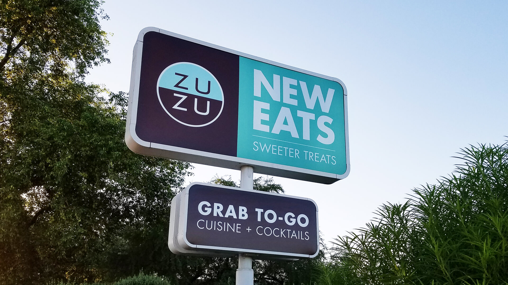 zuzu-Signage