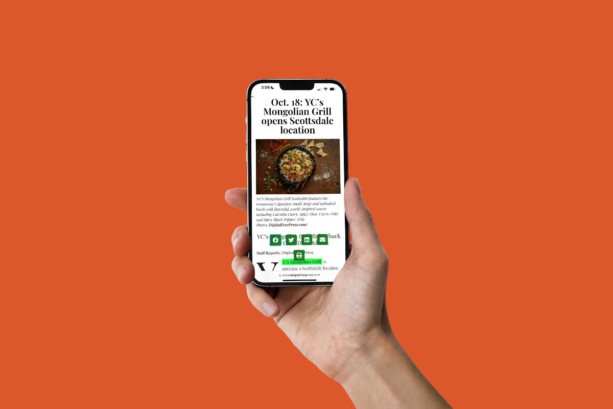 Hand_Holding_iPhone_Mockup_-_YC_PR